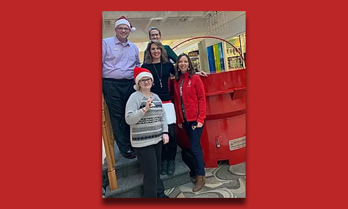 Volunteer Center Staff bell ringing