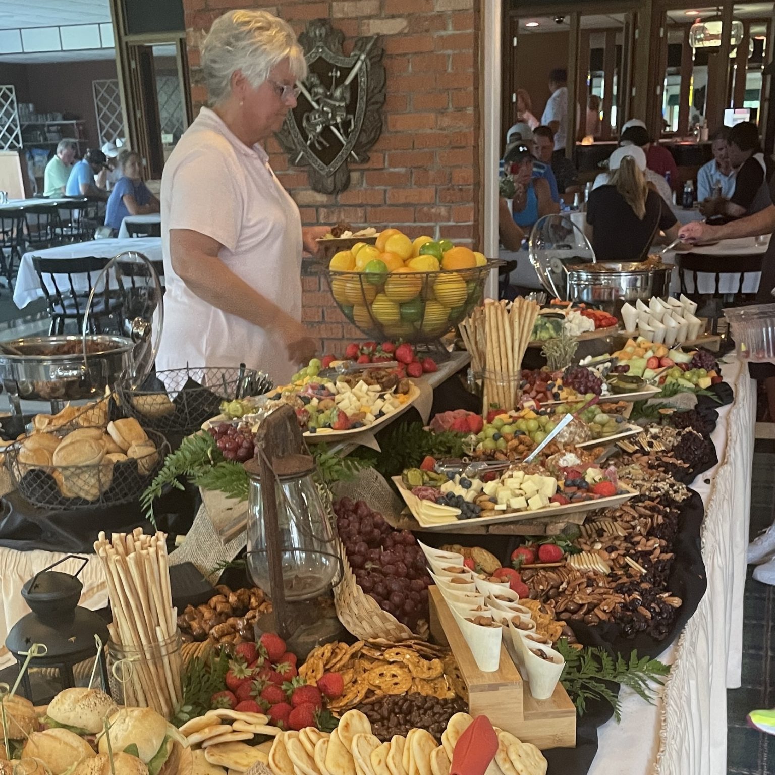 Leanne at a buffet section during the 2022 Golf Outing