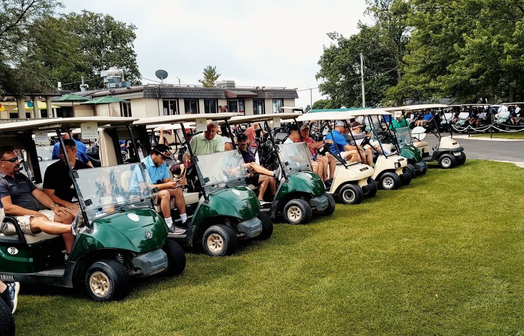 2022 Golf Outing - golfers and carts