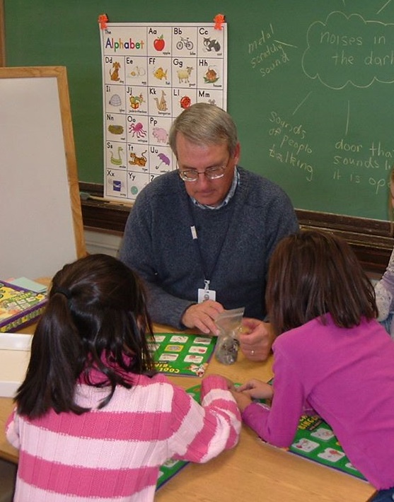 Volunteer Playing Alphabet Game