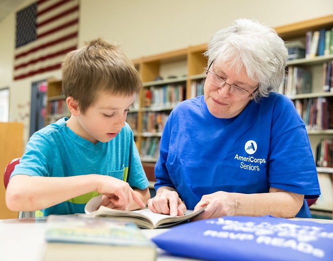 Woman Reading to Child